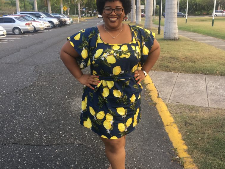 Samantha in a blue dress with lemons