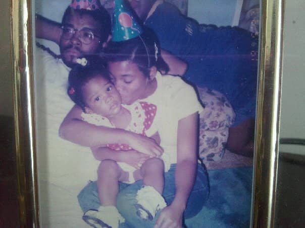 picture of young Samantha with sister and father