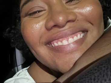 Picture of Samantha's face unclose smiling widely