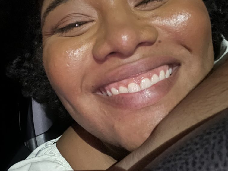 Picture of Samantha's face unclose smiling widely